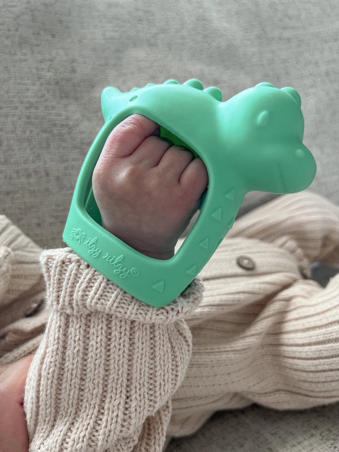 Dino Bitzy Grip™ Hand Teether