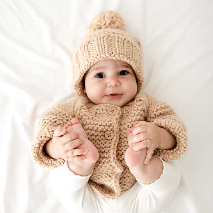 Baby sweater with on sale cap